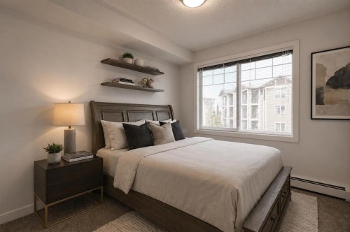 207-22 Panatella Road Nw, Calgary, AB - Indoor Photo Showing Bedroom
