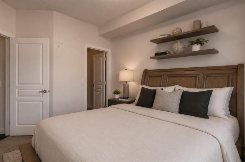 207-22 Panatella Road Nw, Calgary, AB - Indoor Photo Showing Bedroom