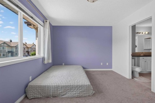 118 Royal Birch Villas Nw, Calgary, AB - Indoor Photo Showing Bedroom