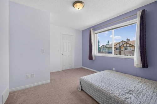 118 Royal Birch Villas Nw, Calgary, AB - Indoor Photo Showing Bedroom