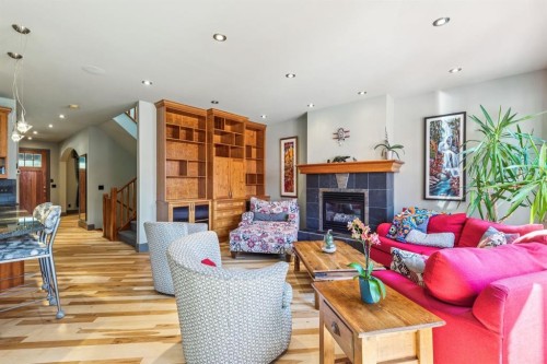 2033 Bowness Road Nw, Calgary, AB - Indoor Photo Showing Living Room With Fireplace