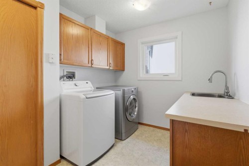 58 Mountain Park Drive Se, Calgary, AB - Indoor Photo Showing Laundry Room