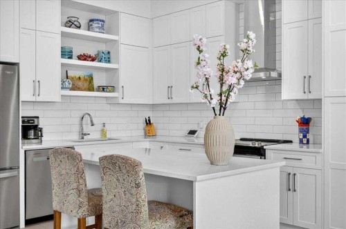 1066 Creekside Boulevard Sw, Calgary, AB - Indoor Photo Showing Kitchen With Upgraded Kitchen