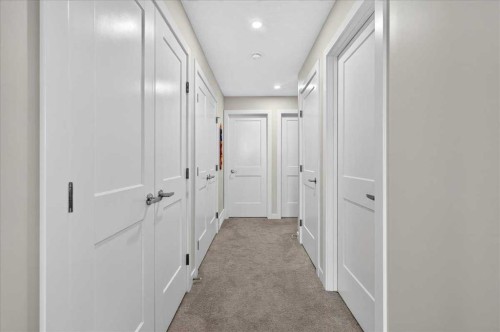 1066 Creekside Boulevard Sw, Calgary, AB - Indoor Photo Showing Other Room