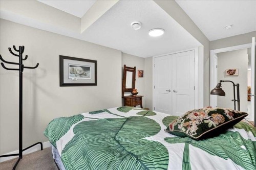 1066 Creekside Boulevard Sw, Calgary, AB - Indoor Photo Showing Bedroom