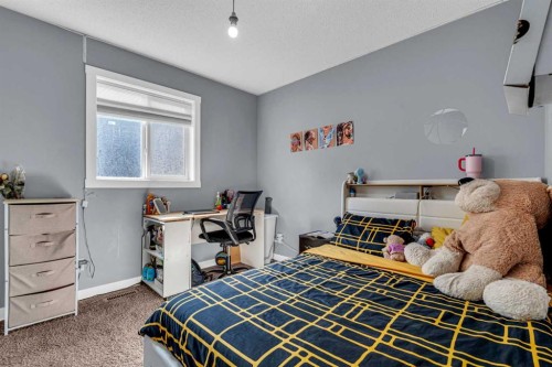 1444 Legacy Circle Se, Calgary, AB - Indoor Photo Showing Bedroom