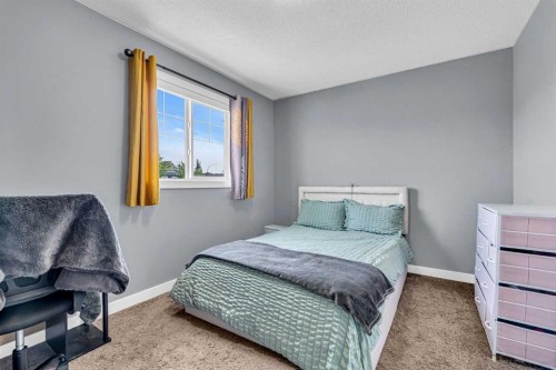 1444 Legacy Circle Se, Calgary, AB - Indoor Photo Showing Bedroom