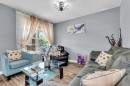 1444 Legacy Circle Se, Calgary, AB  - Indoor Photo Showing Living Room 