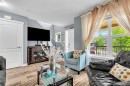 1444 Legacy Circle Se, Calgary, AB  - Indoor Photo Showing Living Room 