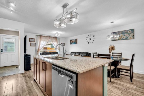 1444 Legacy Circle Se, Calgary, AB - Indoor Photo Showing Kitchen With Double Sink