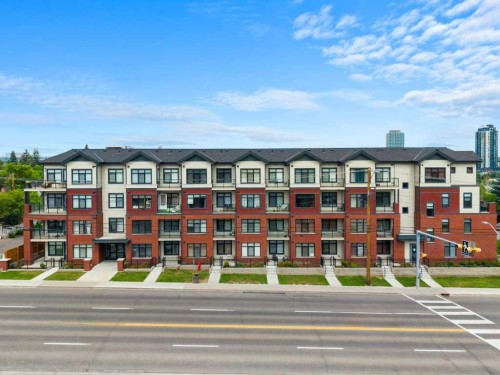 306-1702 17 Avenue Sw, Calgary, AB - Outdoor With Balcony With Facade