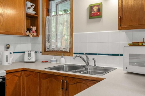 730 2Nd Street, Canmore, AB - Indoor Photo Showing Kitchen With Double Sink