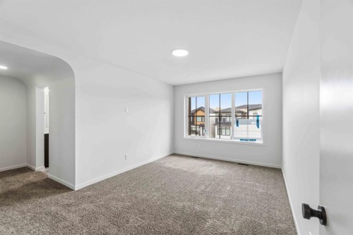86 Heritage Heath, Cochrane, AB - Indoor Photo Showing Other Room