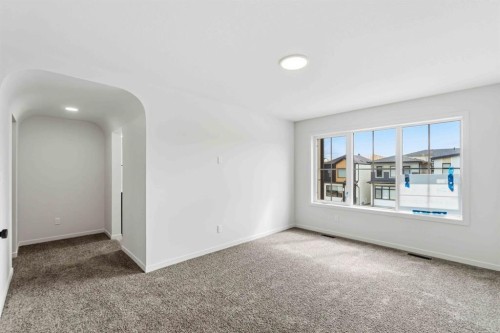 86 Heritage Heath, Cochrane, AB - Indoor Photo Showing Other Room