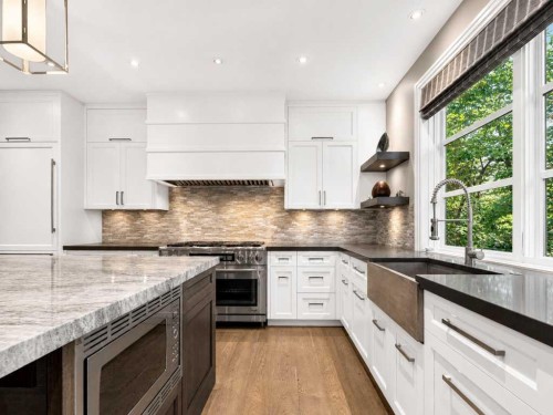 22 Aspen Ridge Square Sw, Calgary, AB - Indoor Photo Showing Kitchen With Upgraded Kitchen