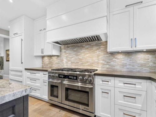 22 Aspen Ridge Square Sw, Calgary, AB - Indoor Photo Showing Kitchen With Upgraded Kitchen