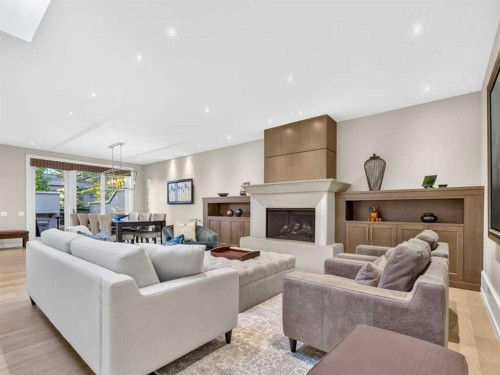 22 Aspen Ridge Square Sw, Calgary, AB - Indoor Photo Showing Living Room With Fireplace