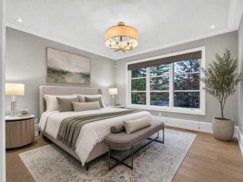 22 Aspen Ridge Square Sw, Calgary, AB - Indoor Photo Showing Bedroom