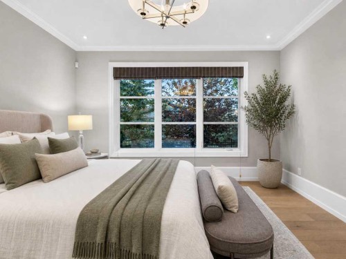 22 Aspen Ridge Square Sw, Calgary, AB - Indoor Photo Showing Bedroom
