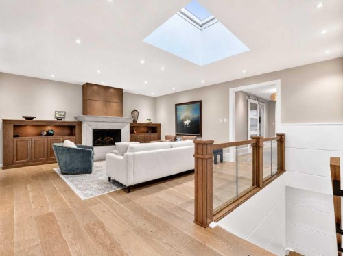 22 Aspen Ridge Square Sw, Calgary, AB - Indoor With Fireplace