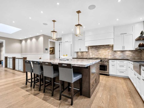 22 Aspen Ridge Square Sw, Calgary, AB - Indoor Photo Showing Kitchen With Upgraded Kitchen