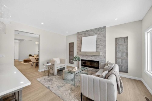 78 Keystone Creek Terrace Ne, Calgary, AB - Indoor Photo Showing Living Room With Fireplace