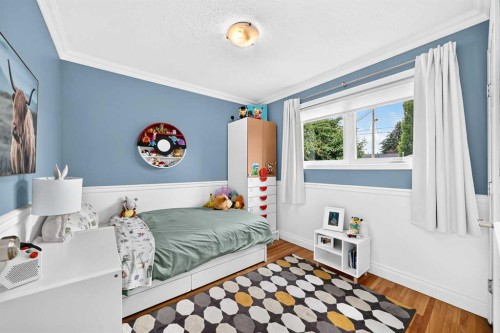 8632 Atlas Drive Se, Calgary, AB - Indoor Photo Showing Bedroom