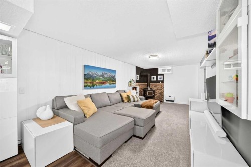 8632 Atlas Drive Se, Calgary, AB - Indoor Photo Showing Living Room
