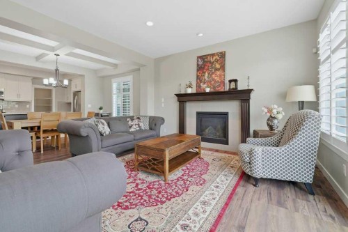 27 Jumping Pound Terrace, Cochrane, AB - Indoor Photo Showing Living Room With Fireplace