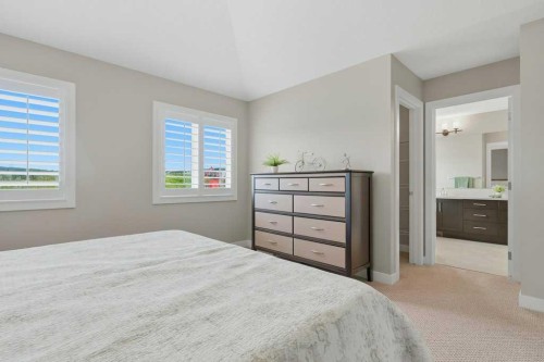 27 Jumping Pound Terrace, Cochrane, AB - Indoor Photo Showing Bedroom