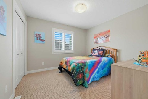 27 Jumping Pound Terrace, Cochrane, AB - Indoor Photo Showing Bedroom