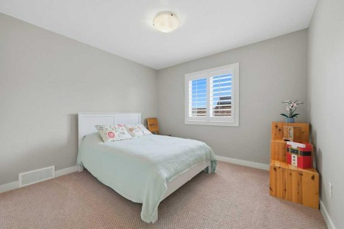 27 Jumping Pound Terrace, Cochrane, AB - Indoor Photo Showing Bedroom