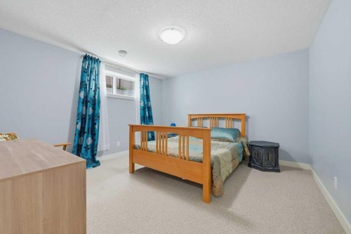 27 Jumping Pound Terrace, Cochrane, AB - Indoor Photo Showing Bedroom