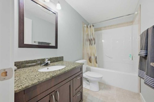 27 Jumping Pound Terrace, Cochrane, AB - Indoor Photo Showing Bathroom