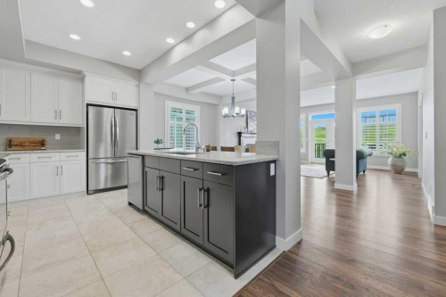 27 Jumping Pound Terrace, Cochrane, AB - Indoor Photo Showing Kitchen With Upgraded Kitchen