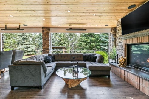 14 Pinehurst Drive, Heritage Pointe, AB - Indoor Photo Showing Living Room With Fireplace