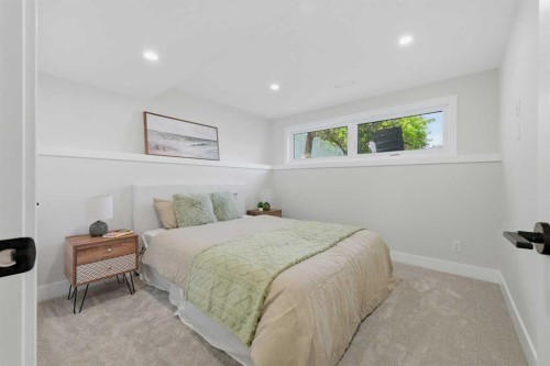 1132 Lake Sylvan Place Se, Calgary, AB - Indoor Photo Showing Bedroom