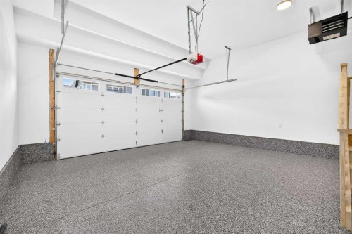 107 West Grove Gate Sw, Calgary, AB - Indoor Photo Showing Garage