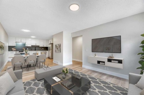 8-75 Templemont Way Ne, Calgary, AB - Indoor Photo Showing Living Room