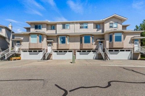 116 Country Hills Gardens Nw, Calgary, AB - Outdoor With Facade