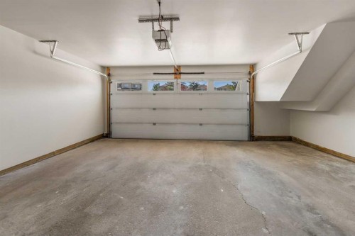 116 Country Hills Gardens Nw, Calgary, AB - Indoor Photo Showing Garage