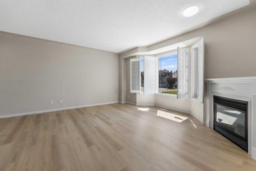 116 Country Hills Gardens Nw, Calgary, AB - Indoor With Fireplace