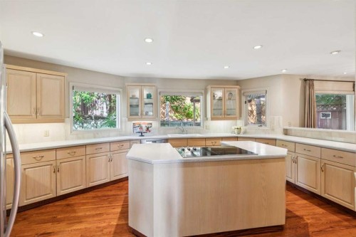 48 Patterson Mews Sw, Calgary, AB - Indoor Photo Showing Kitchen With Double Sink