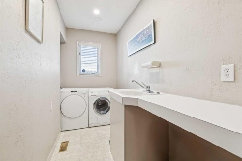 48 Patterson Mews Sw, Calgary, AB - Indoor Photo Showing Laundry Room