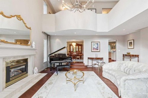 48 Patterson Mews Sw, Calgary, AB - Indoor Photo Showing Living Room With Fireplace