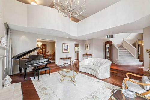 48 Patterson Mews Sw, Calgary, AB - Indoor Photo Showing Living Room