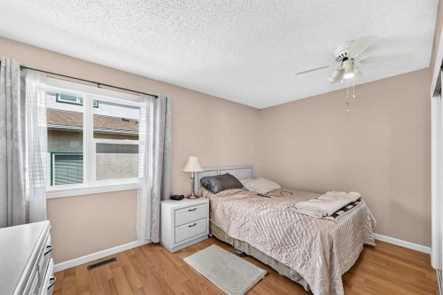 3516 26A Street Se, Calgary, AB - Indoor Photo Showing Bedroom