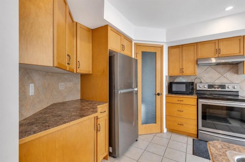 167 Valley Crest Close Nw, Calgary, AB - Indoor Photo Showing Kitchen