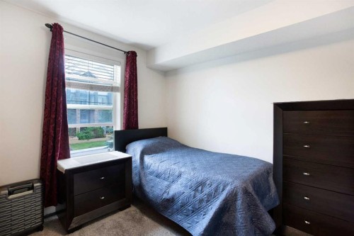 210-2000 Applevillage Court Se, Calgary, AB - Indoor Photo Showing Bedroom