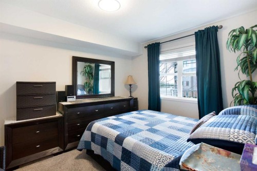 210-2000 Applevillage Court Se, Calgary, AB - Indoor Photo Showing Bedroom